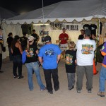 A croud gathers around the 4 Wheel to Heal booth at the Tierra Del Sol Desert Safari
