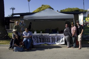 Wounded Veterans stand in front of the 4 Wheel to Heal booth at th Ventura County Offroad Show Apr 21, 2013